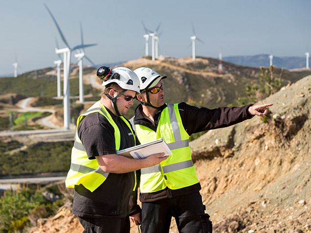 Technicians servicing third party wind power fleets